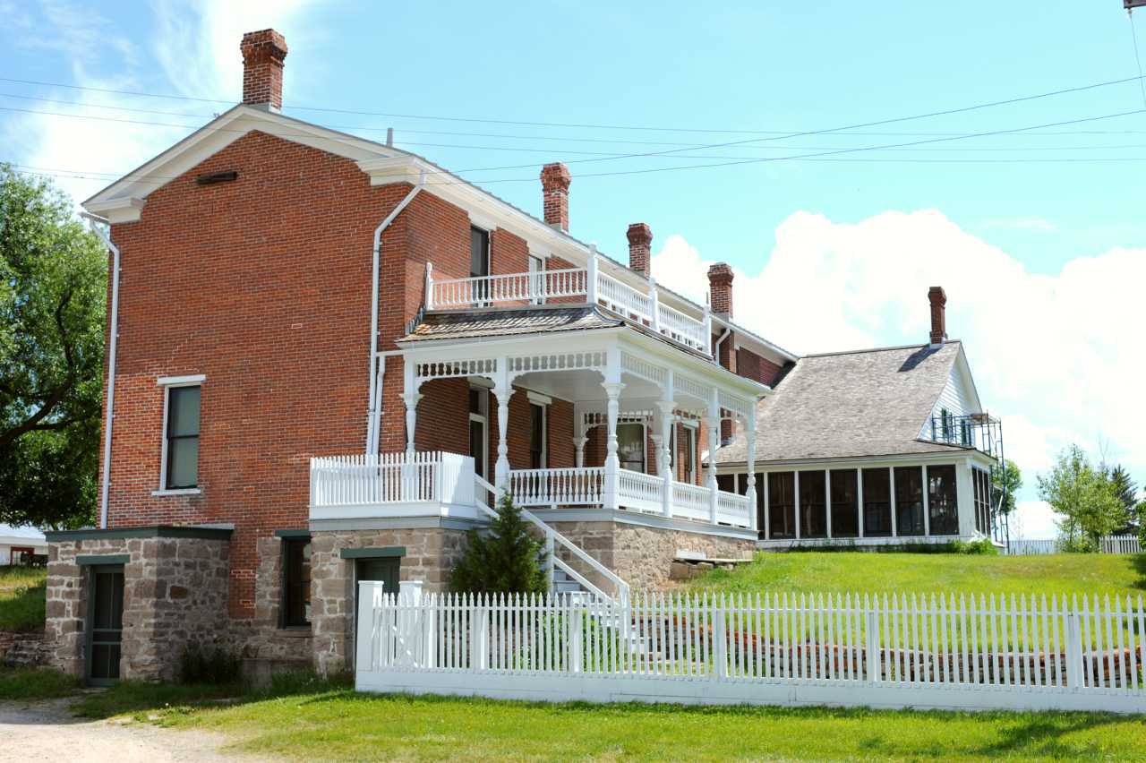 A view of the rear of the ranch house.