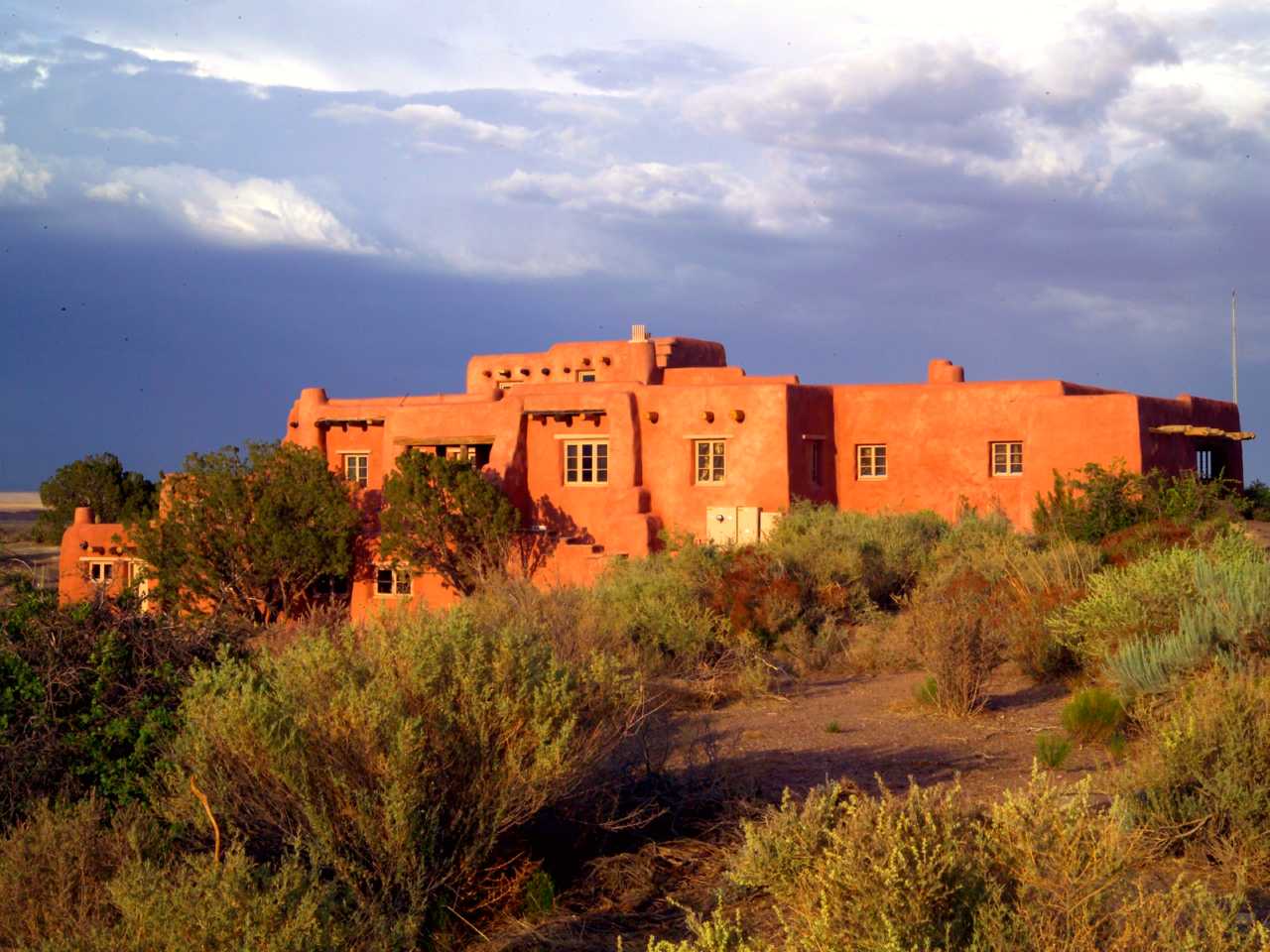 Sunset lights up the Painted Desert Inn National Historic Landmark west side.