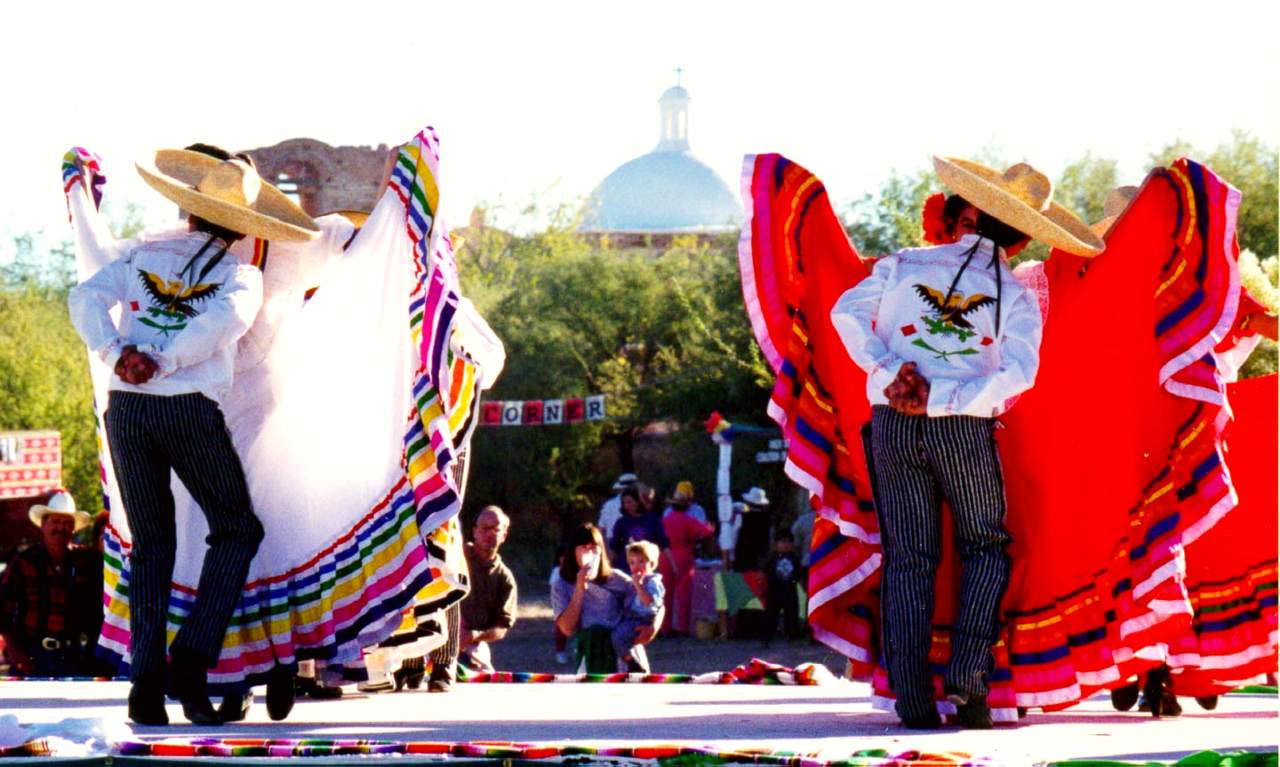 folklorico dancers in front of church