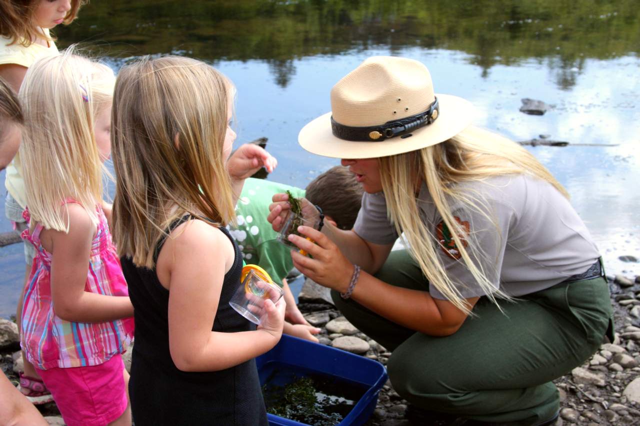 a Park Ranger shows children the wonders of nature