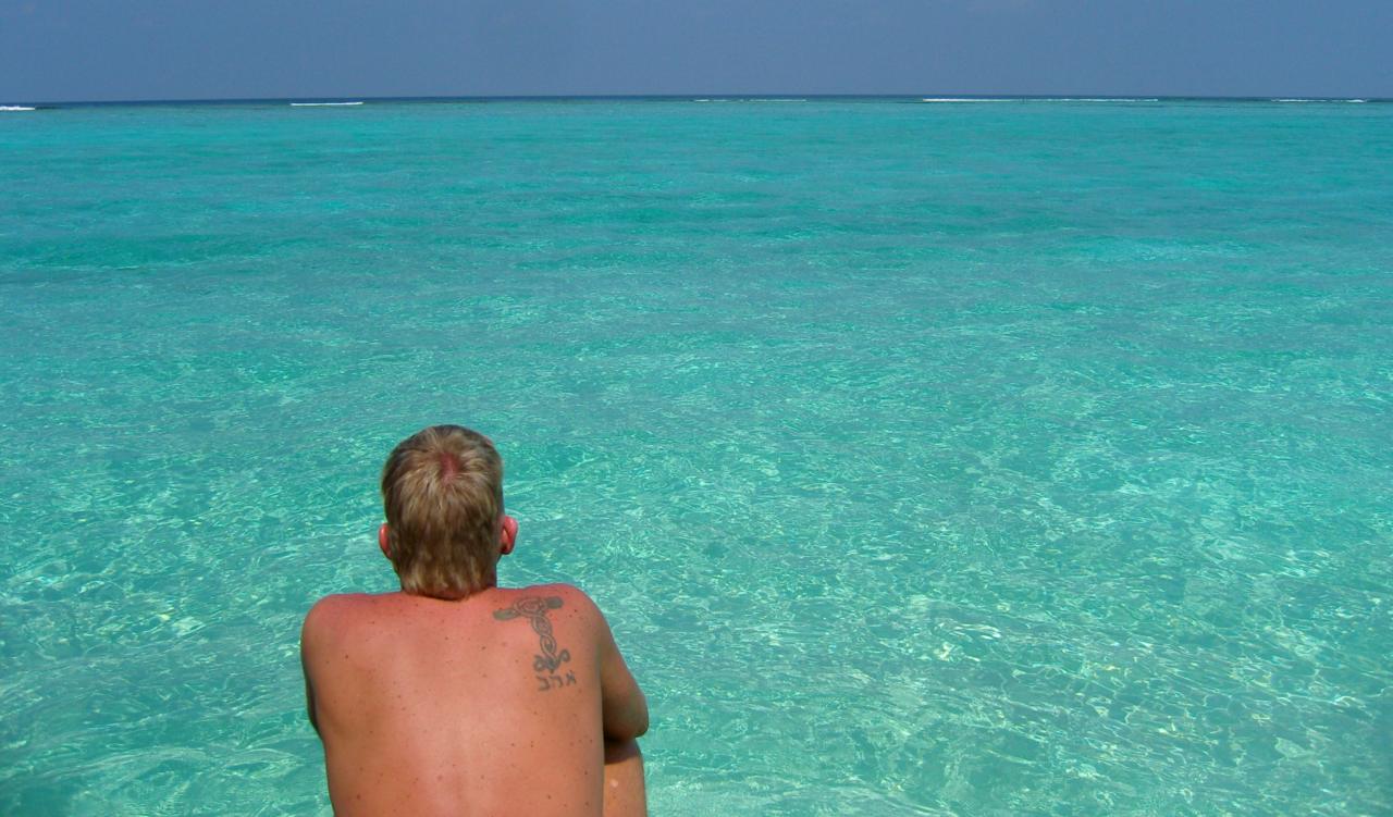 View from the beach on the turquoise ocean.