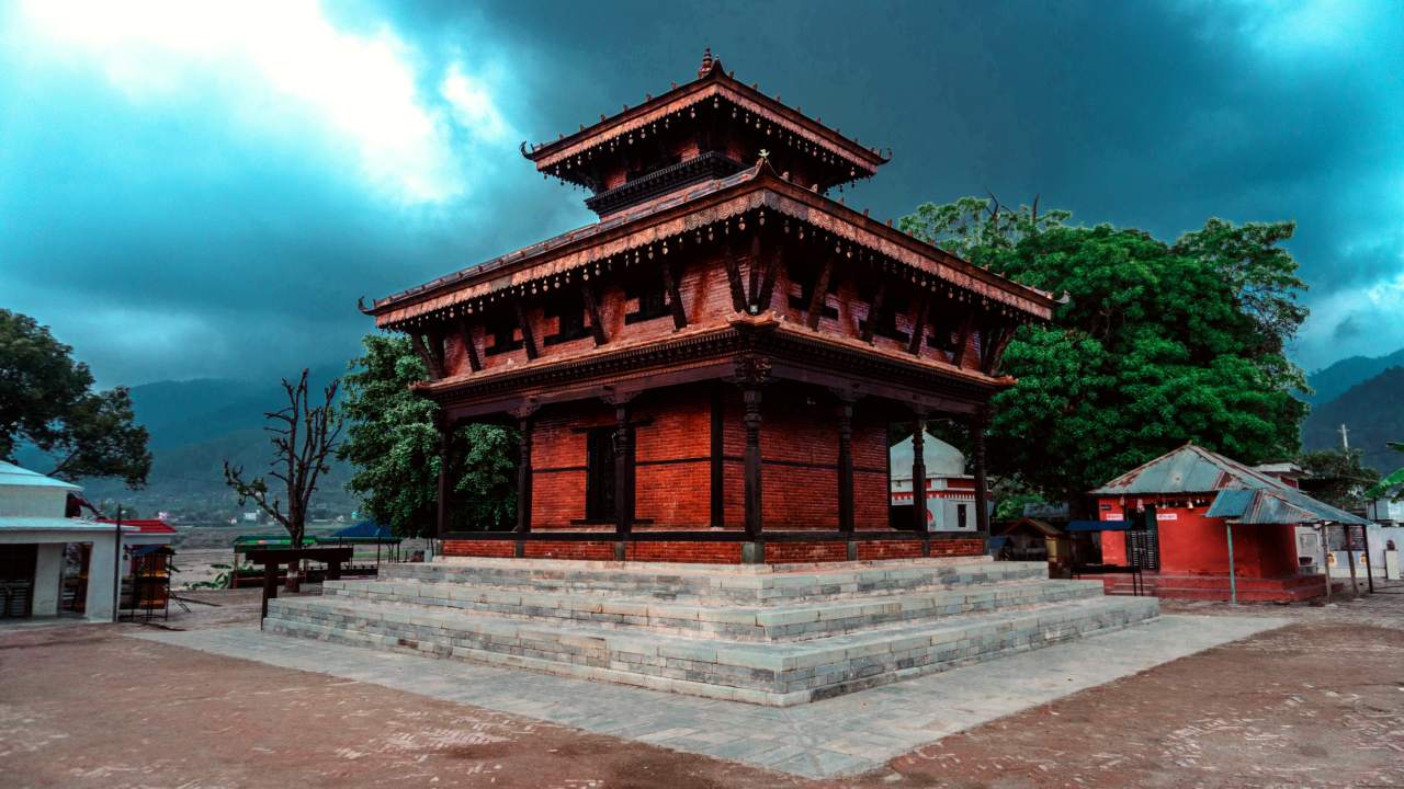 Ambikeshwori Temple, Dang is a Shakta pitha which is supposed to have emerged due to the falling of right ear of Satidevi according to the Swasthani Purana.