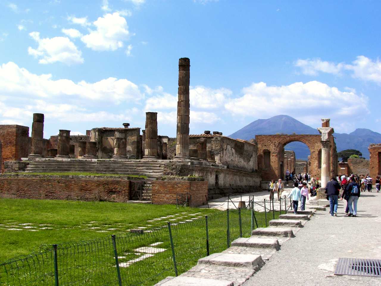 The Forum of Pompeii with Vesuvius in the distance. Pompeii is Italy's third and the world's 48th most visited destination, with over 2.5 million tourists a year.
