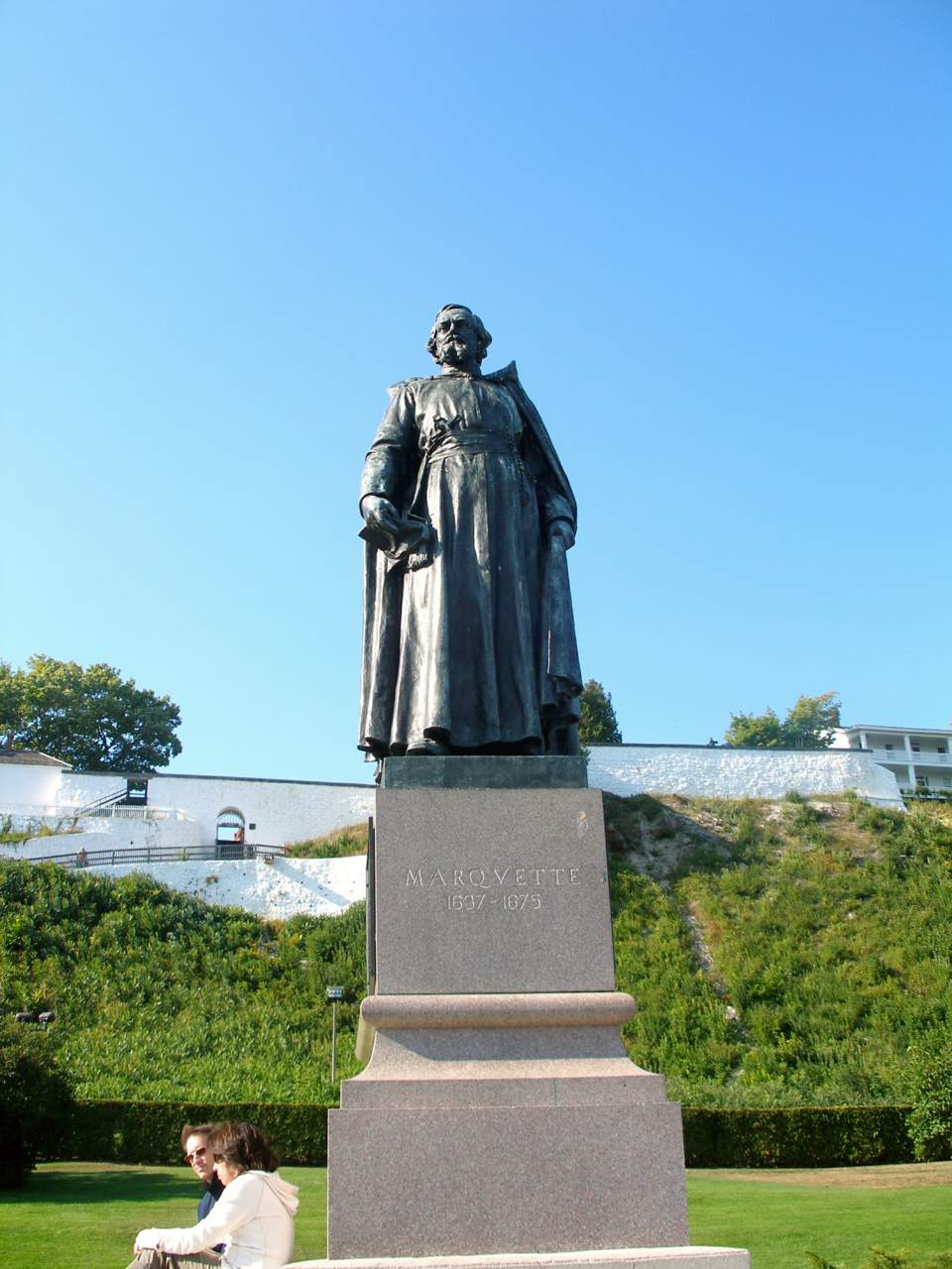 The statue of Jacques Marquette, Jesuit priest and Great Lakes explorer, in front of Fort Mackinac
