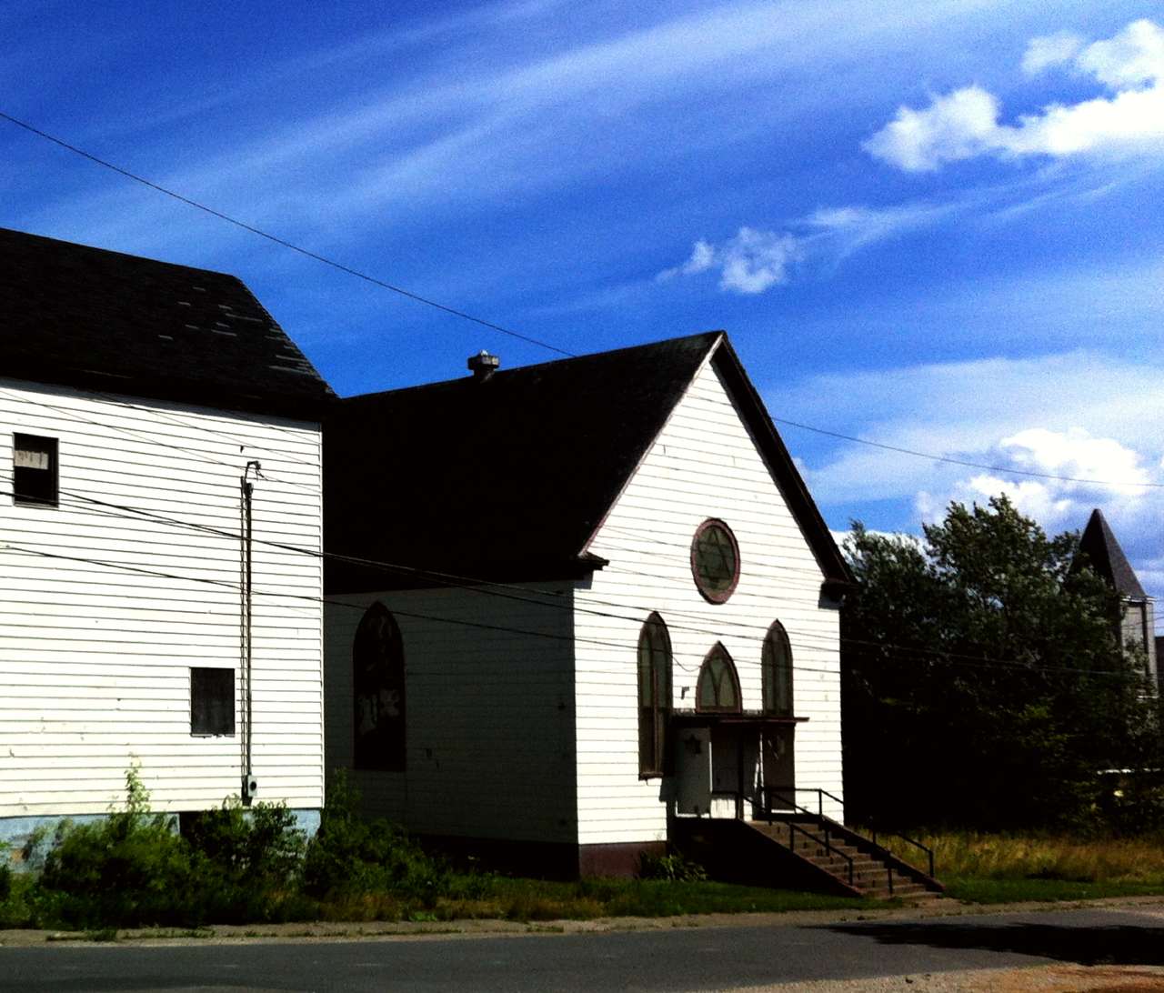 The former Congregation Sons of Israel synagogue, in Glace Bay. In 1902, the synagogue was Nova Scotia's first purpose-built synagogue. It permanently closed in July 2010. To the left is the also closed Talmud Torah community centre. This was the loc