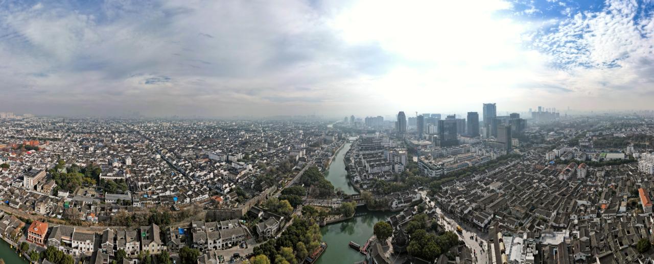 Aerial panorama of Suzhou in 2023 and the Grand Canal that runs through it