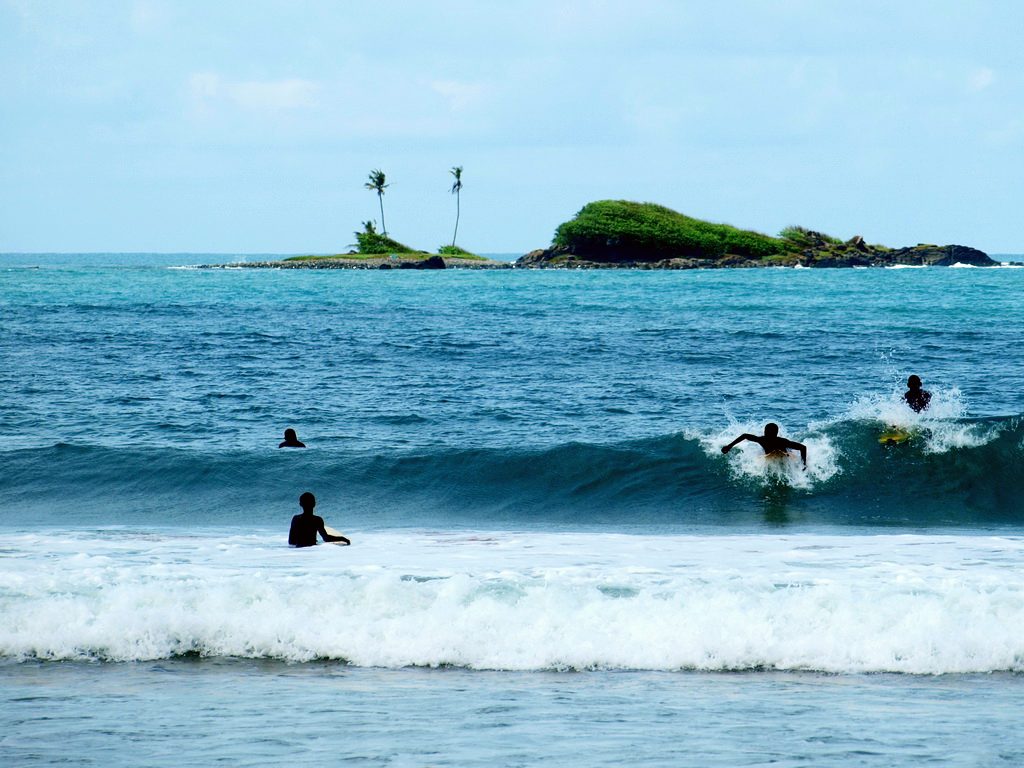 Catch the waves at Busua Beach
