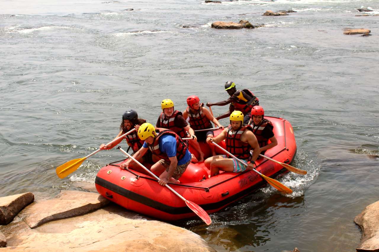 People rafting on the source of the Nile in Uganda.