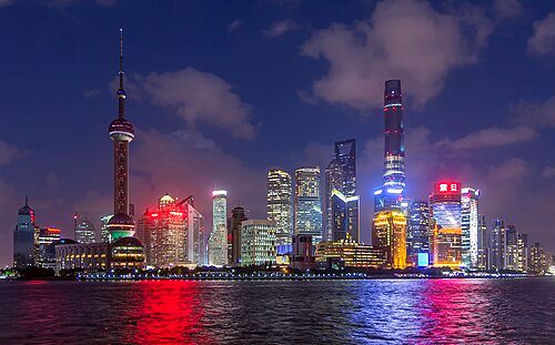 Shanghai's skyline attracts foreign and domestic tourists to view it from the Bund