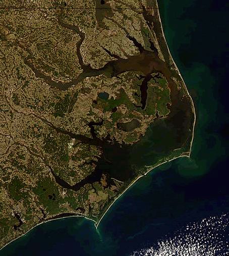 The Outer Banks, separating the Atlantic Ocean (east) from Currituck Albemarle Sounds (north) and Pamlico Sound (south)