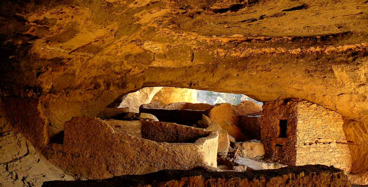 View of Mogollon dwelling rooms within a cave.